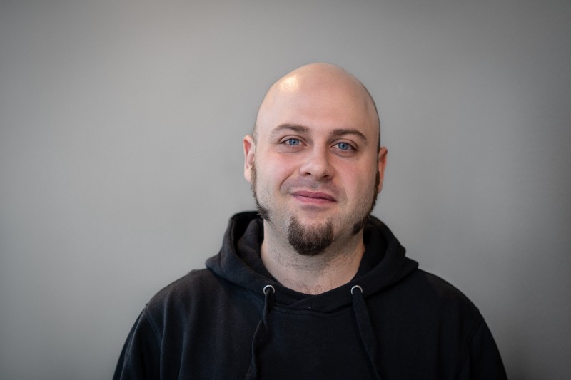 A portrait of Emanuel Stoi, a senior sysadmin at Project A